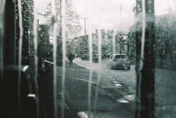 The Hotwell Road in Bristol, shot on grainy film through the stained glass of a telephone box